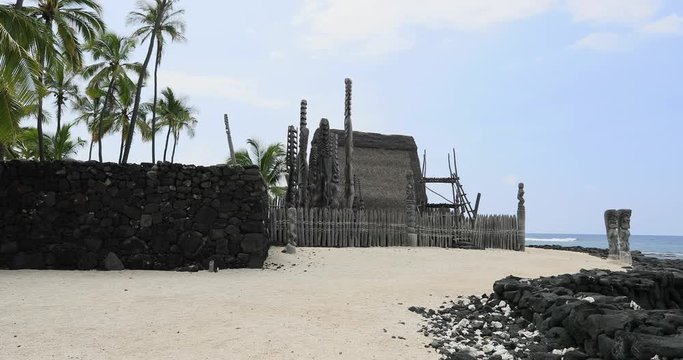 Pu uhonua o Honaunau National Historical Park wooden. Tropical wonderland. Big Island, largest, most volcanic active location. Economy is tourism based. Water and tropical beach recreation and fun.