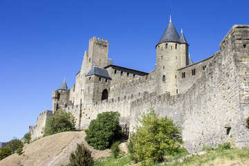 Fototapeta na wymiar Towers and walls of the Cite de Carcassonne, a medieval fortress citadel located in the Languedoc-Roussillon region. A World Heritage Site since 1997