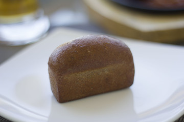 beautiful black bread on a white plate