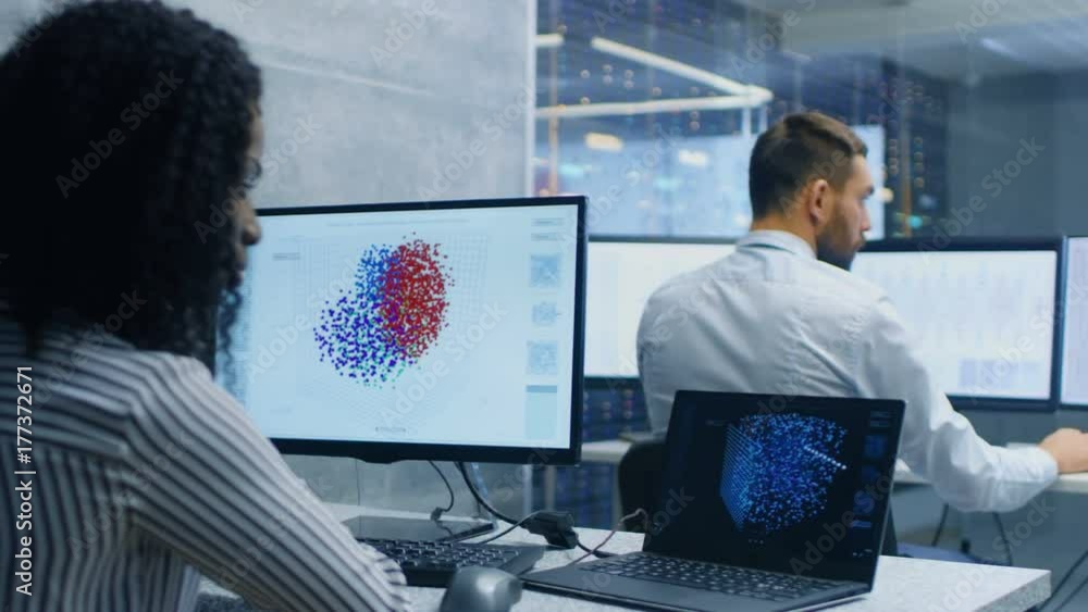 Aufkleber Multi-Ethnic Team of Computer Scientists Create Neural Network at Their Workstation. Office is Full of Displays Showing 3D Representations of Neural Networks.