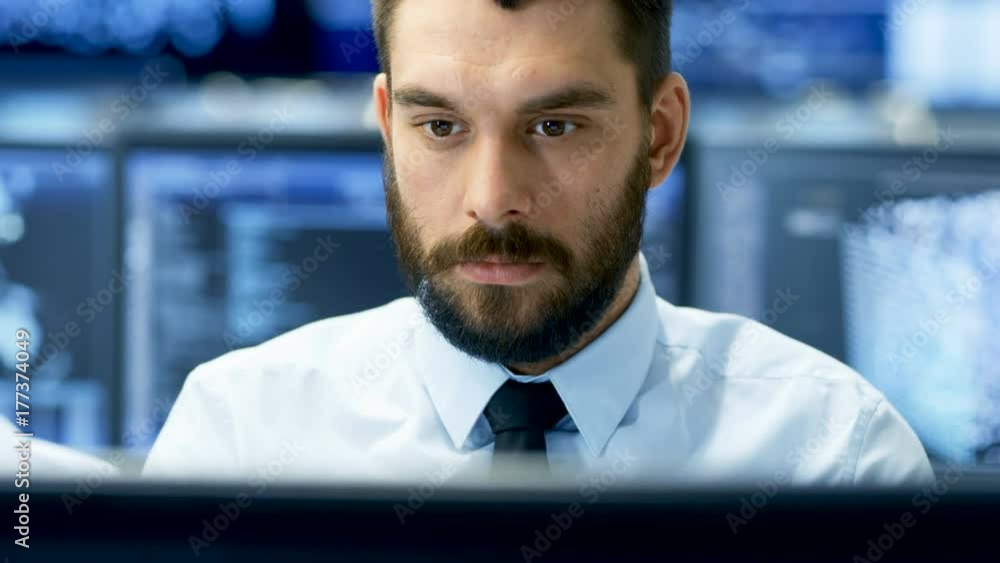 Poster Neural Network and Machine Learning Engineer Working Hard at His Workstation. Multiple Displays Show Neural Network Representation.