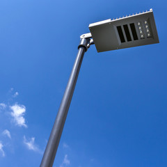 Modern street lamp against the sky
