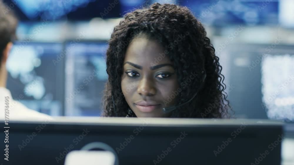 Poster female customer service representative answer client's questions in a headset. he works for a big te