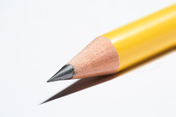 Macro shot of the point of a yellow pencil