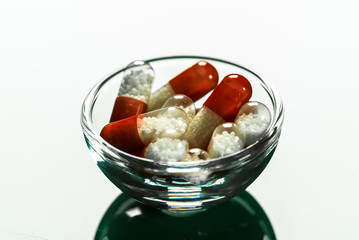 colorful pills in bowls