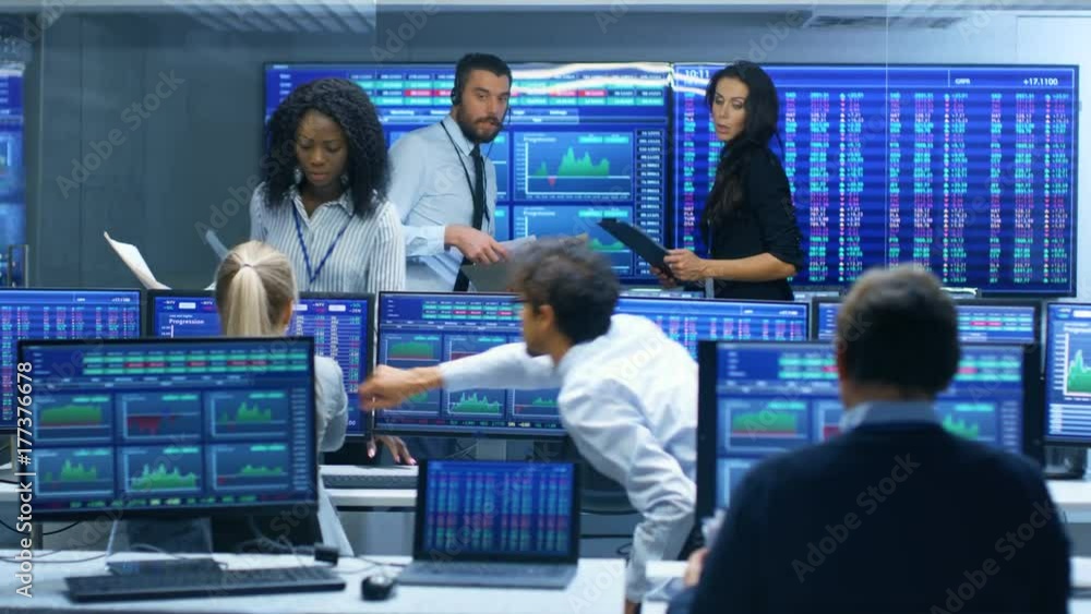 Aufkleber multi-ethnic team is busy working at the stock exchange office. traders and brokers buy and sell sto
