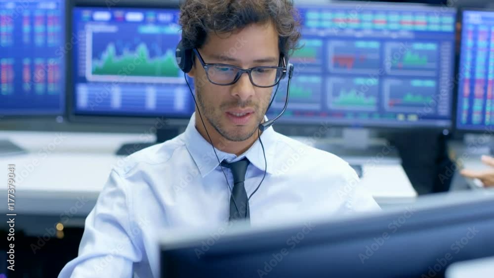 Poster Customer Support Service Representative Talks with a Client Through Headset. He's Working in a Big Technical Consulting Company.
