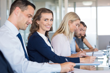 Businesswoman attending meeting