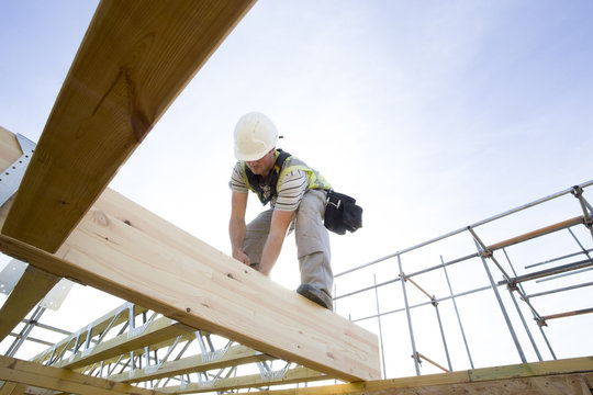 Construction site (carpenters working on house build).