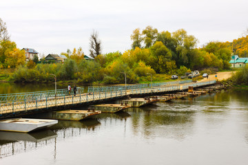 Fototapeta na wymiar Ponton bridge over the Klyazma River. Gorokhovets, Vladimir oblast, Russia