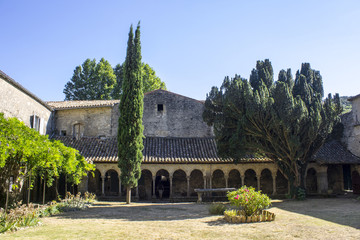 Fototapeta na wymiar The Abbaye Sainte-Marie de Villelongue, a former Benedictine abbey in Saint-Martin-le-Vieil, Southern France