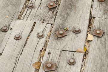 Old wooden bridge structure and timber