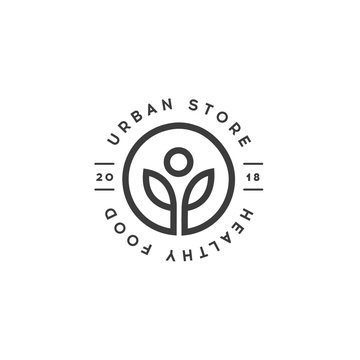 Healthy Food Store logo template. Urban Shop of Organic Food Vector symbol. Healthy lifestyle Vector Design element. Vegan cafe emblem.