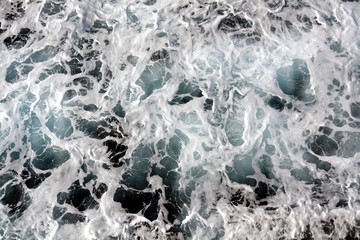 Waves, water and blue bubbles
