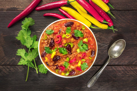 Chili con carne, traditional Mexican dish, with chili peppers