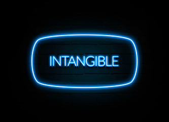 Intangible  - colorful Neon Sign on brickwall
