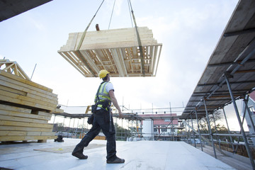 Construction site (carpenters working on house build).