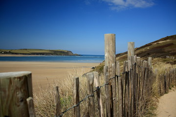 Fence and beach, Cornwall England