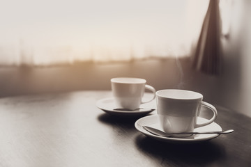 two coffee cups on table near windows morning romantic love concept