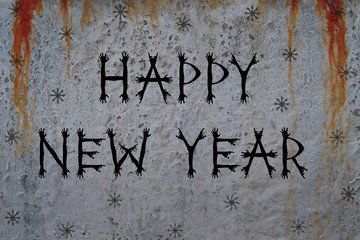 Inscription HAPPY NEW YEAR and snowflakes on bloody cement wall background. Creative font made from zombie hand silhouettes. Concept for greeting or invitation card.