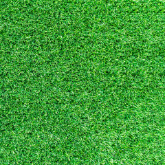 Fototapeta premium Artificial green grass texture or green grass background for golf course. soccer field or sports background concept design.