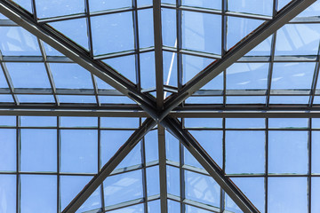 clear glass roof with metal frame for light pass through in the building for saving energy and keep worm