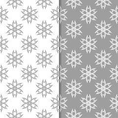 White and gray floral backgrounds. Set of seamless patterns