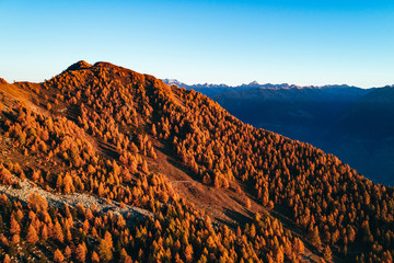 Valtellina (IT) - Vista aerea autunnale dell'Alpe Colina - Tramonto