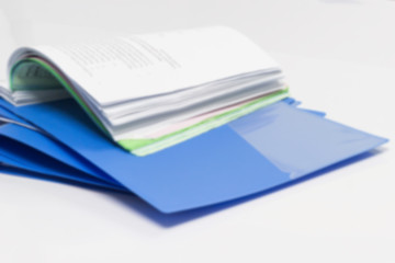 blurred - blue files folder. retention of contracts and paper.  