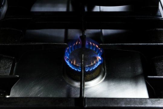 flames burning from gas stove