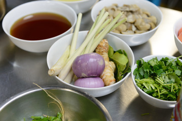 ingredients for TomYam spicy soup on table in the kitchen