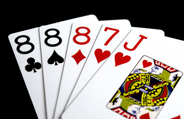 Close Up of Poker Hand Three of a Kind