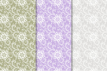 Set of colored floral ornaments. Vertical seamless patterns