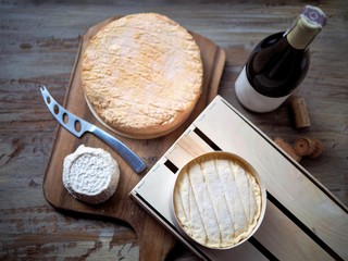 Three French cheeses and wine Epoisses Soumaintrain Morvan