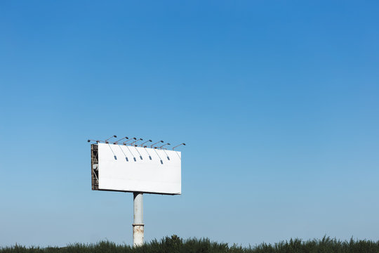 White Billboard Against the Blue Sky