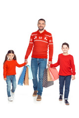 Obraz premium father and children with shopping bags