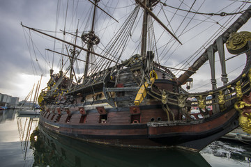 The Neptune, a ship replica of a 17th-century Spanish galleon built in 1985 for Roman Polanski's film Pirates. Currently an attraction in the port of Genoa, Italy - obrazy, fototapety, plakaty