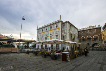 Fototapeta premium The Palazzo San Giorgio or Palace of St. George near the strada sopraelevata. Port of Genoa, Italy