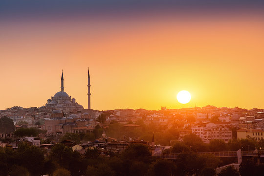 silhouette of the mosque with minarets at sunset in Istanbul
