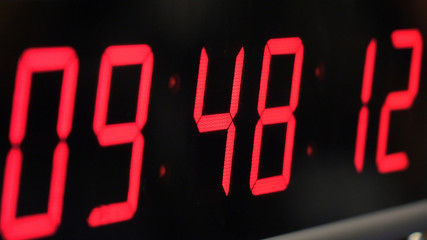 Red digital Timer, numbers counting.