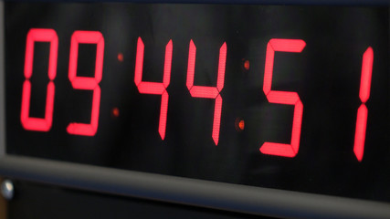 Red digital Timer, numbers counting.