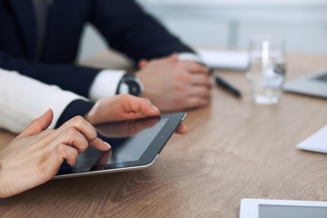 Group of business people or lawyers  at meeting, hands close-up