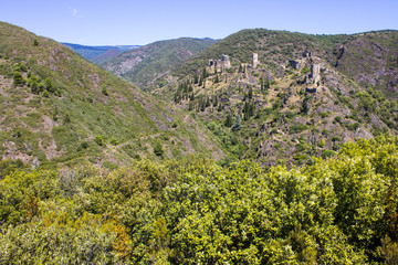 The Chateaux de Lastours (in Occitan Lastors), four so-called Cathar castles on a rocky spur above...