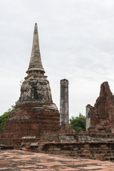 Fototapeta na wymiar Ancient pagoda with ruin in foreground at Wat Mahathat, Ayutthaya