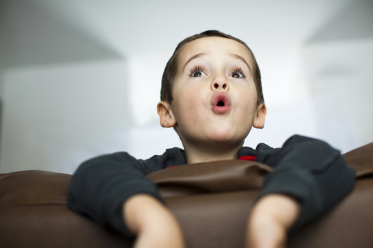 Little Boy Surprised Watching Movie