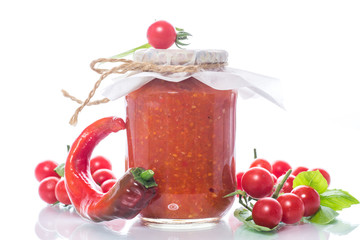 Homemade organic tomato sauce in a glass jar