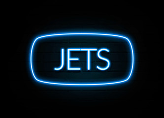 Jets  - colorful Neon Sign on brickwall