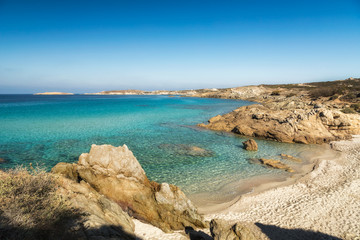 Small sandy beach and turquoise Mediterranean near Lumio in Corsica