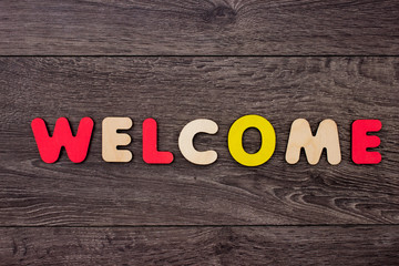 Fototapeta premium Word Welcome from wooden letters 