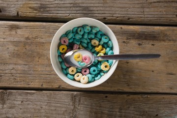 Bowl of cereal loops with spoon